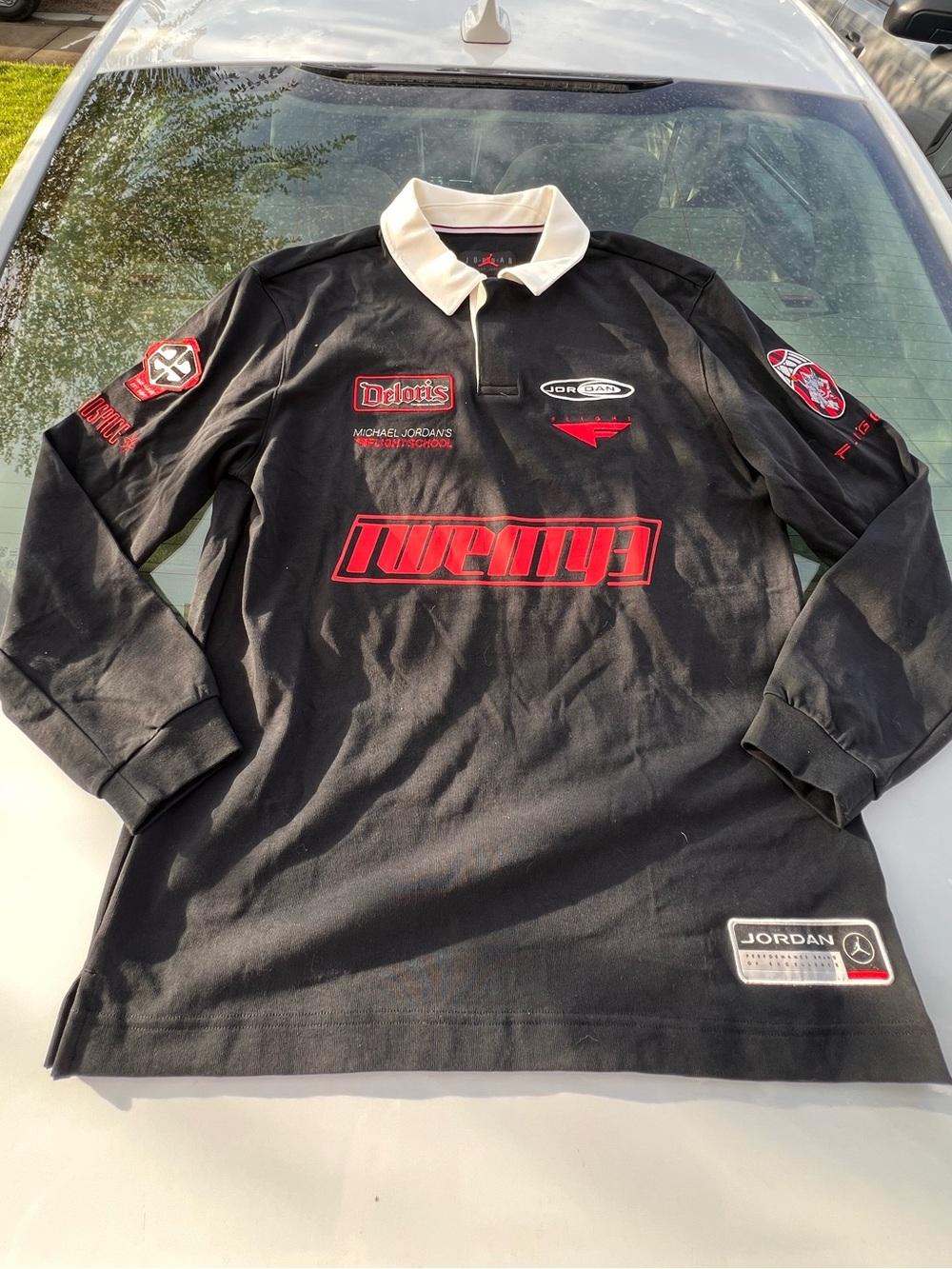 Jordan Black Long-Sleeve Polo with Red Logos and White Collar